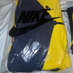 Yellow and blue Nike sweatsuit. Size XL.